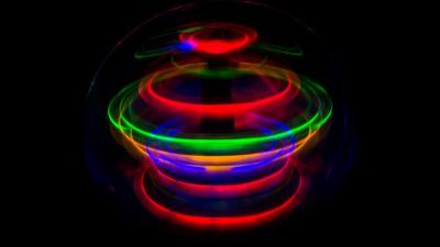 spinning top with multi-colored lights to represent spintroncis